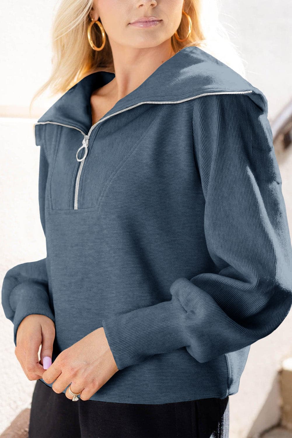 Pocketed Quarter Zip Collared Neck Sweatshirt.