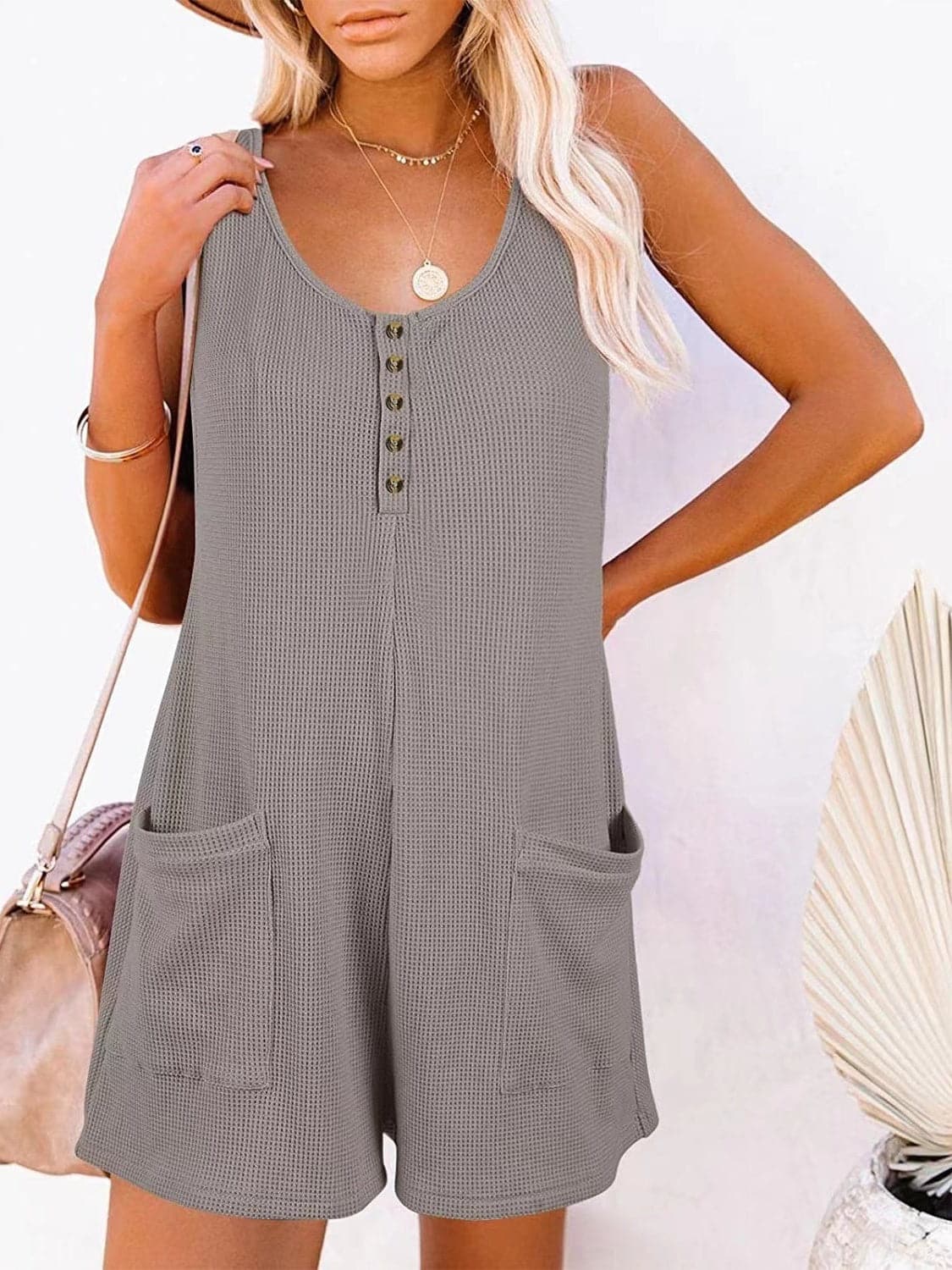 Full Size Pocketed Scoop Neck Sleeveless Romper.