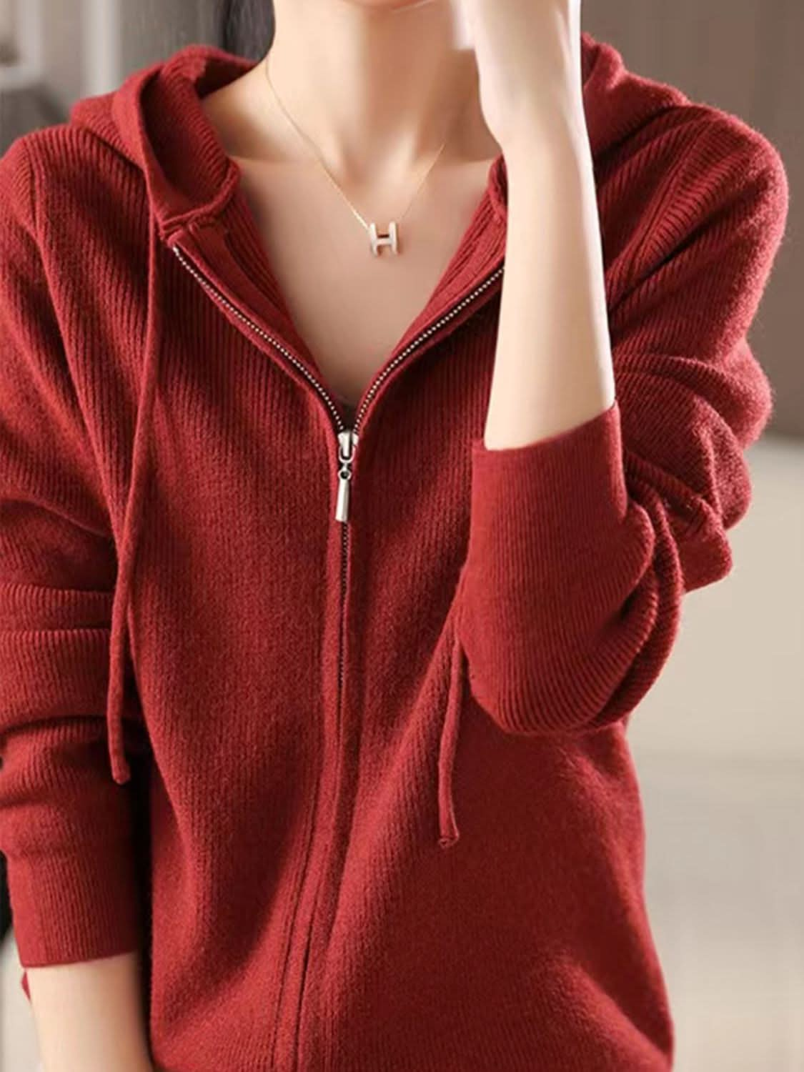 Cozy drawstring hooded sweater with zip-up design