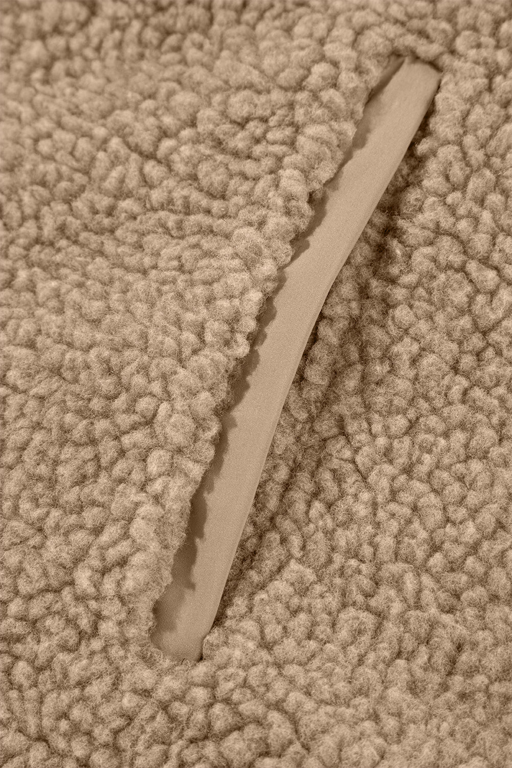 Close-up of the smooth zip-up closure and comfortable cuffs on the Love Salve Hooded Fleece Jacket for quality.