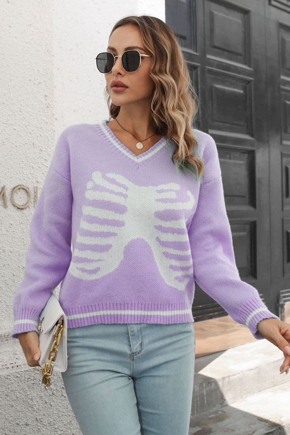 Chic skeleton graphic V-neck pullover sweater