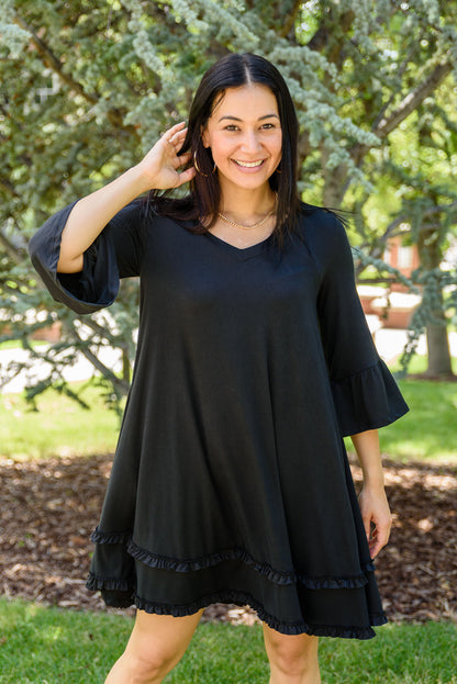 Chic black plus size ruffled sleeve dress for effortless elegance