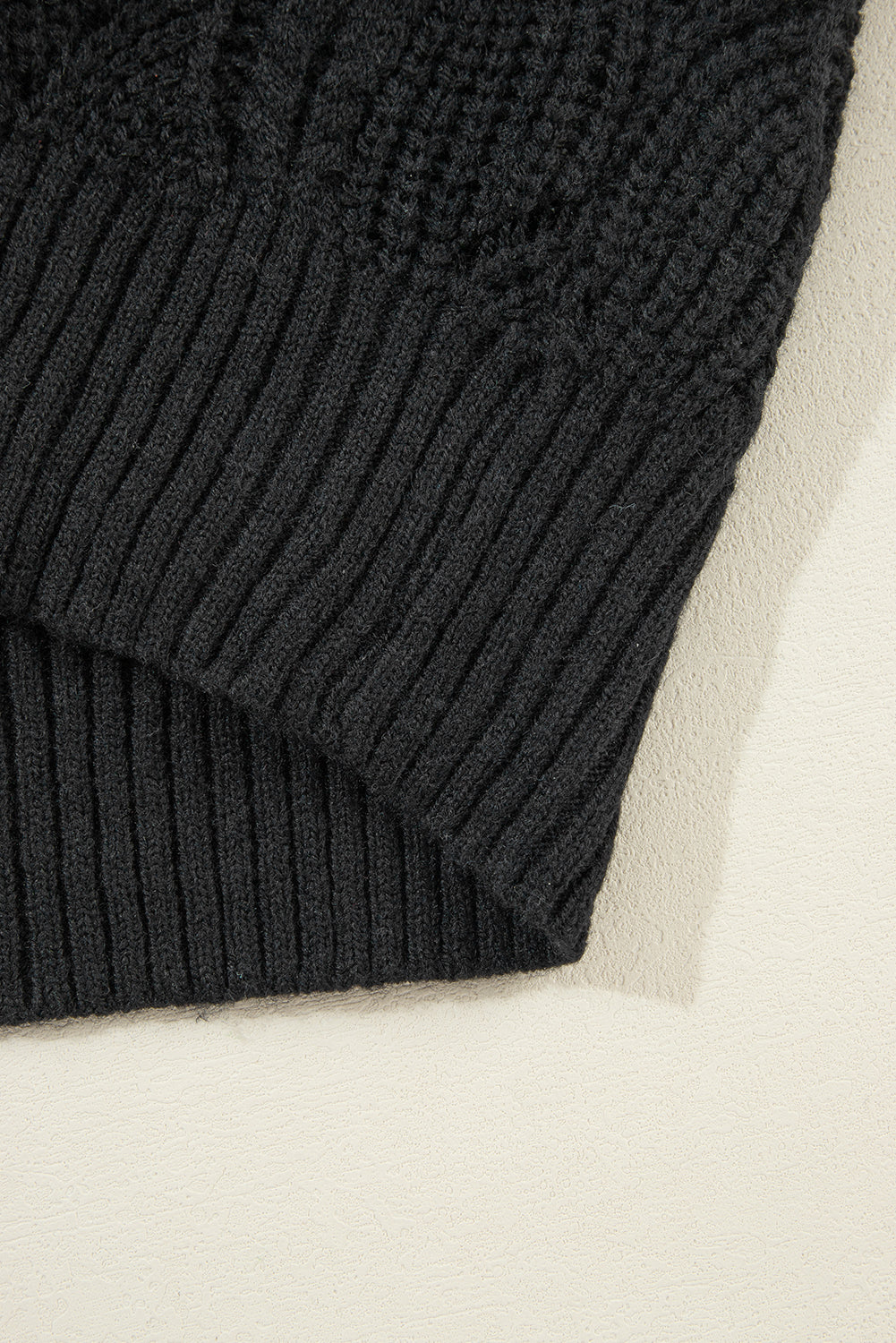 Chic black hollow knit v-neck sweater