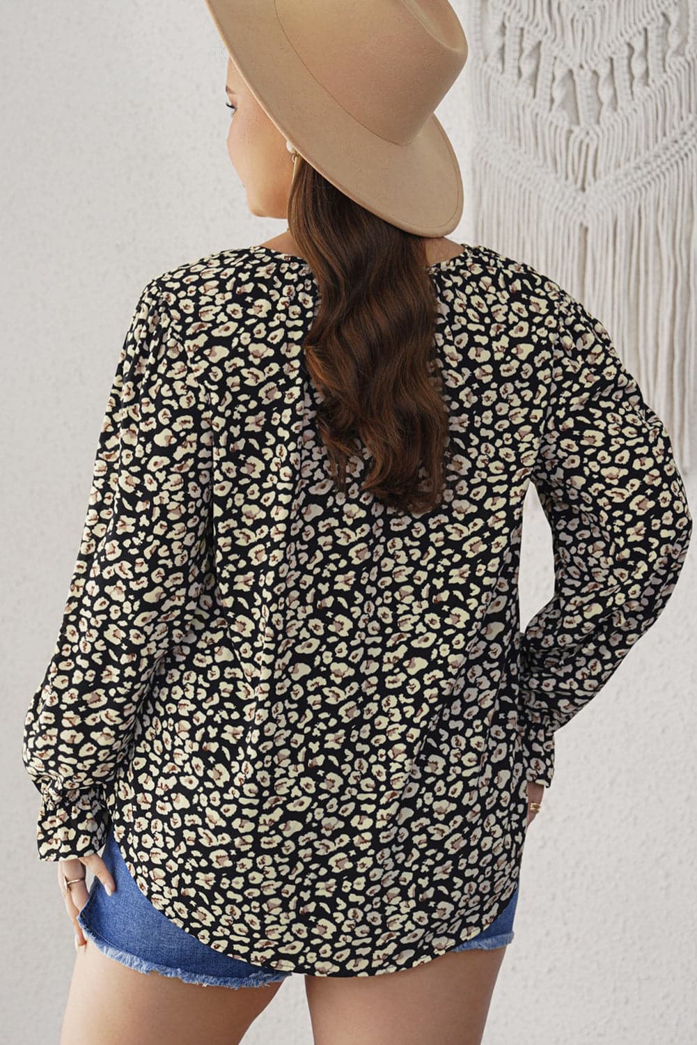 Plus Size Floral Flounce Sleeve Tie-Neck Blouse.