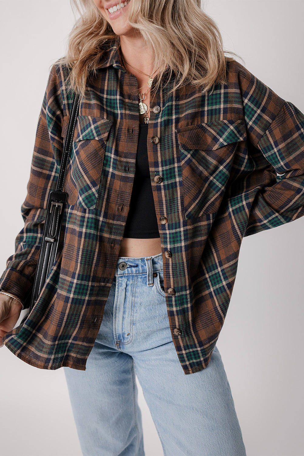 Brown plaid button-up shacket with chest pockets