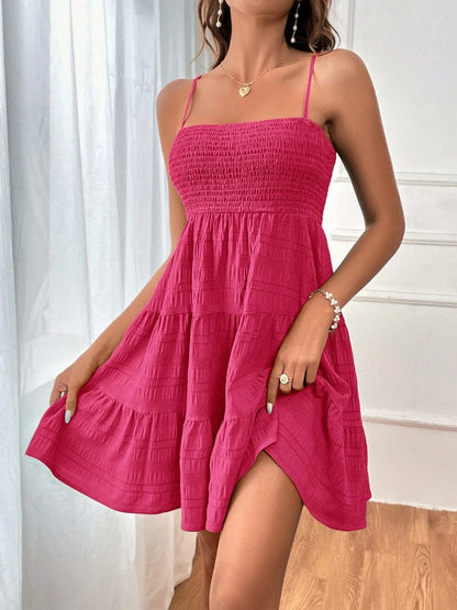 Smocked Tiered Sleeveless Mini Dress.