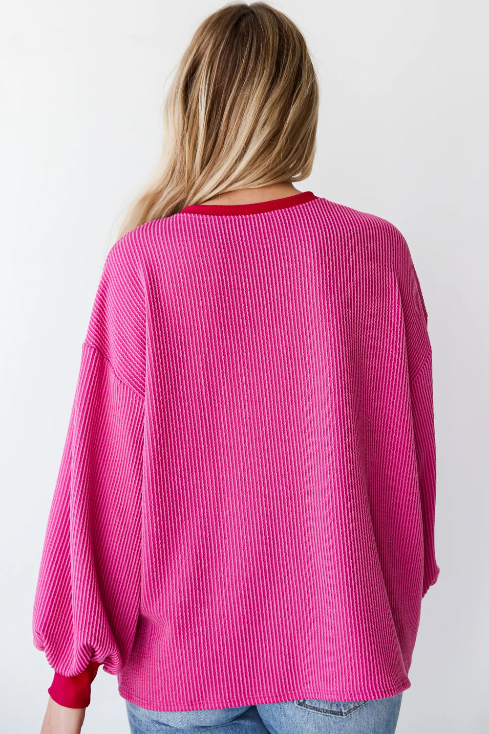 Bright pink drop shoulder top