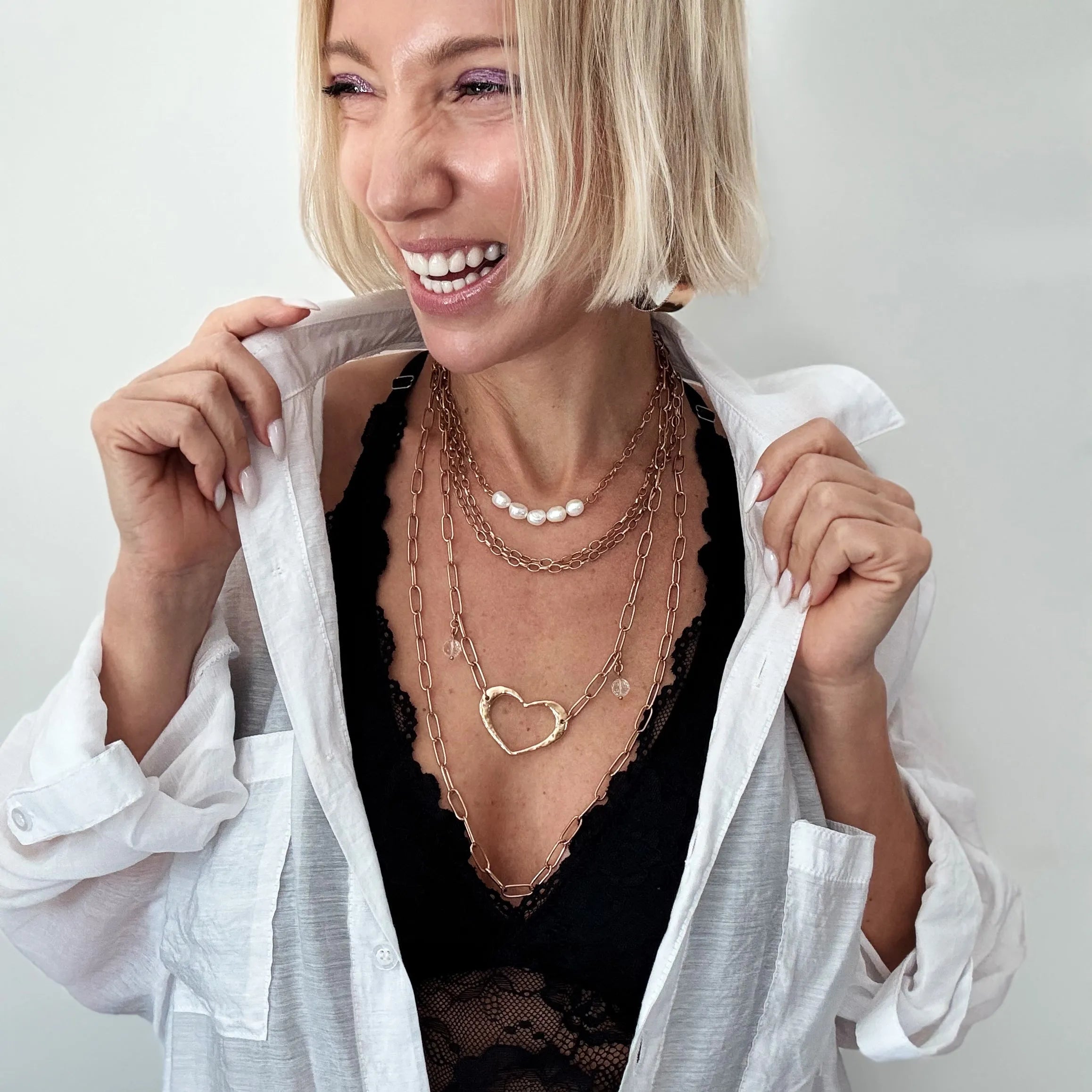 Full view of the Katia Designs Love Open Heart Long Chain Necklace, highlighting its graceful drape and versatile style for e