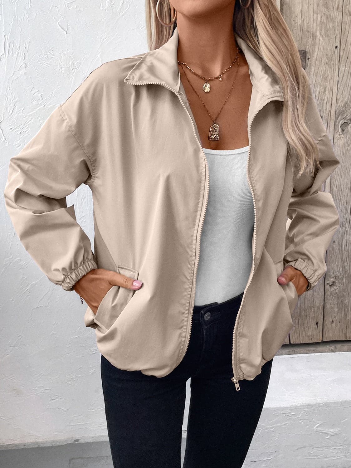 Pocketed Zip Up Long Sleeve Jacket.