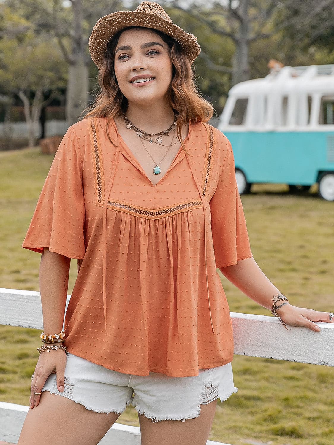 Plus Size Ruched Tie Neck Half Sleeve Blouse.