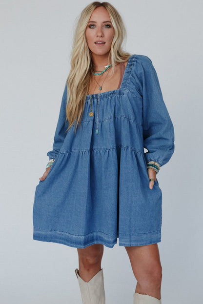 Dusk blue denim mini dress with square neckline and side pockets