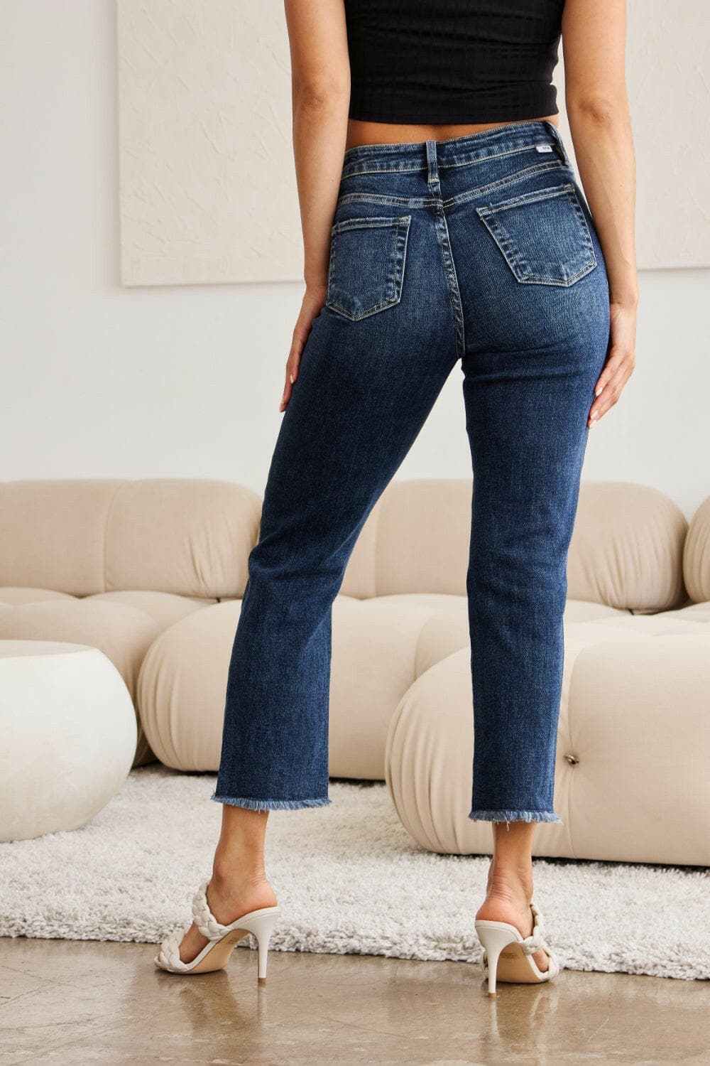 RFM Full Size Tummy Control Distressed High Waist Raw Hem Jeans.