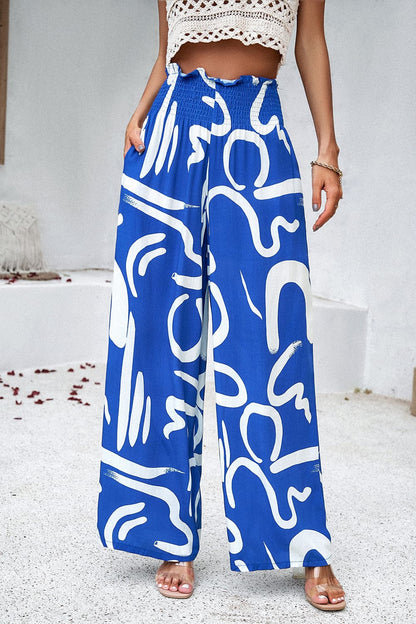 Smocked Printed Wide Leg Pants with Pockets.