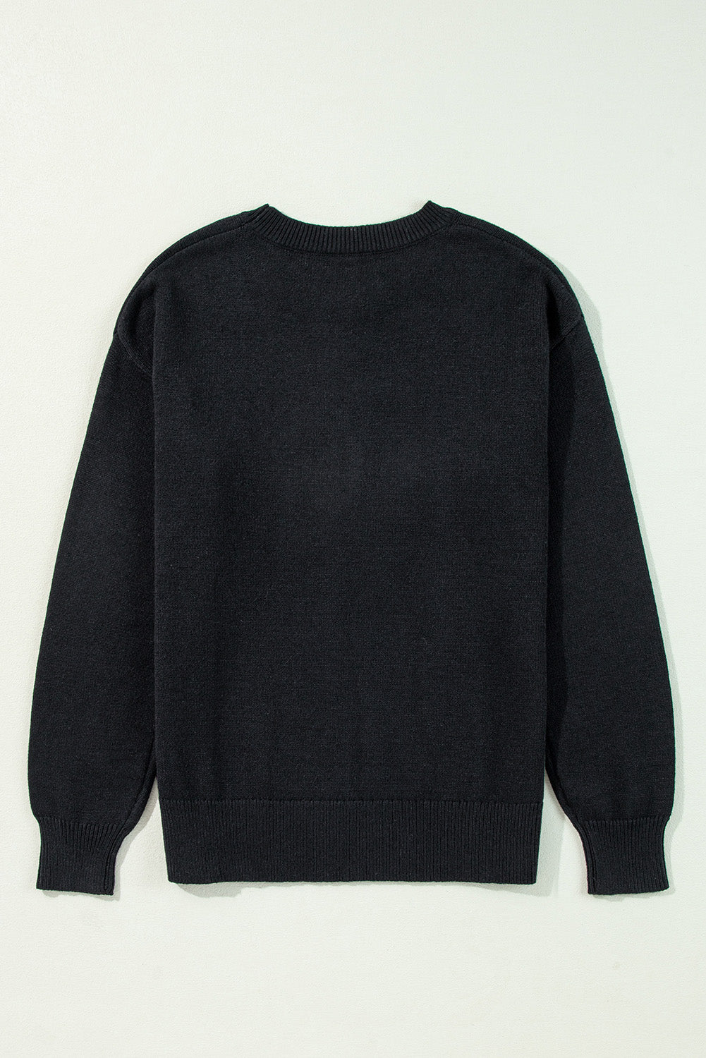 Cozy black "Boo" knitted sweater with ribbed edges for casual style