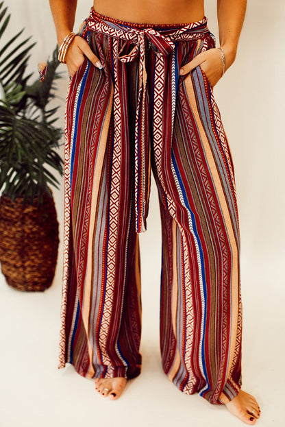 Vibrant red bohemian wide leg pants with ethnic stripes and tie waist