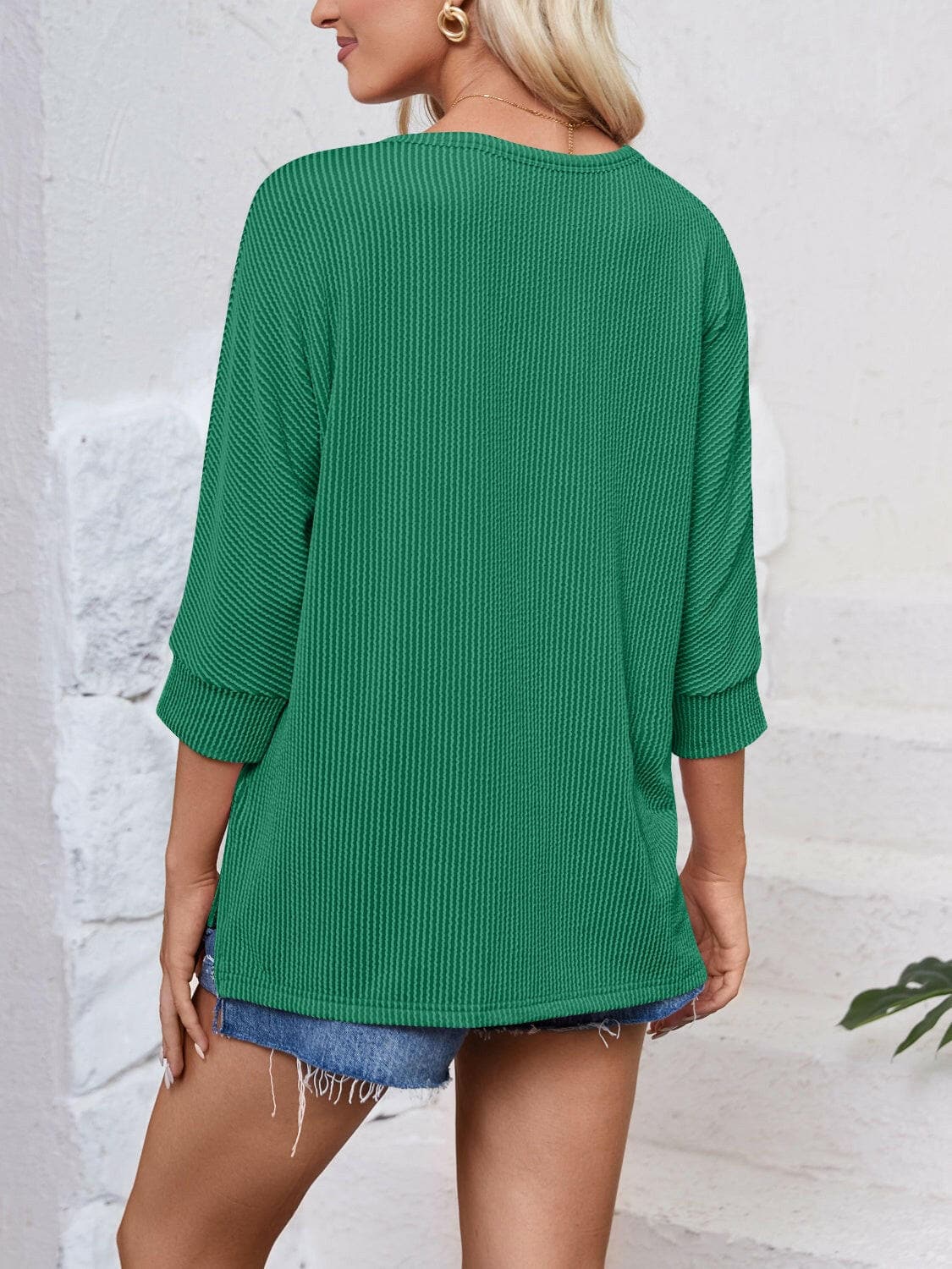 Textured Round Neck Three-Quarter Sleeve Blouse.