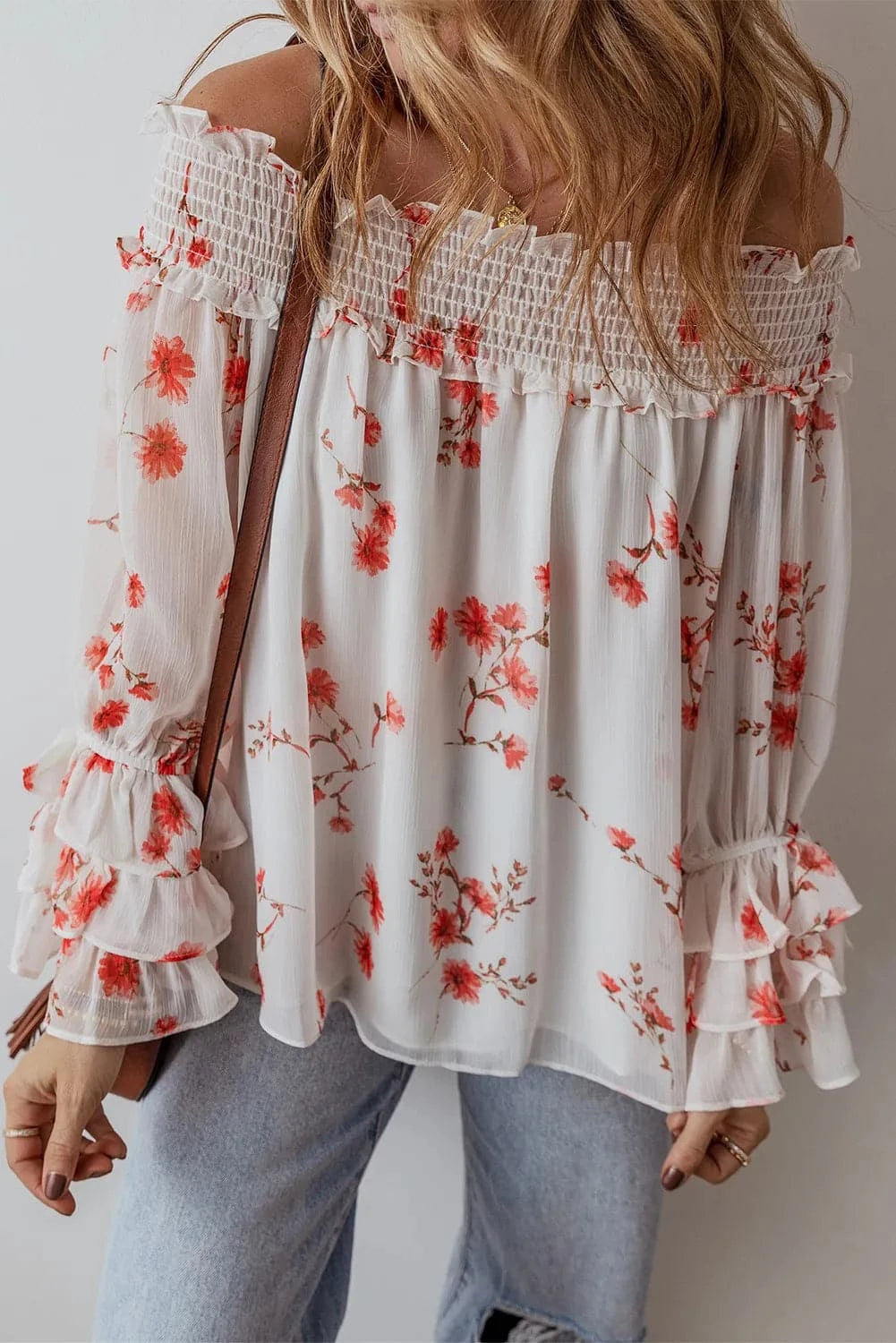 Sheer ruffled off-shoulder blouse