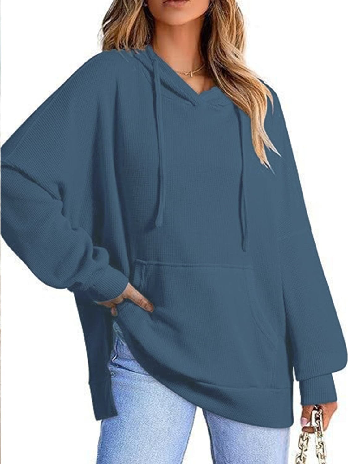 Sleek pocketed hoodie with drawstring and side slit