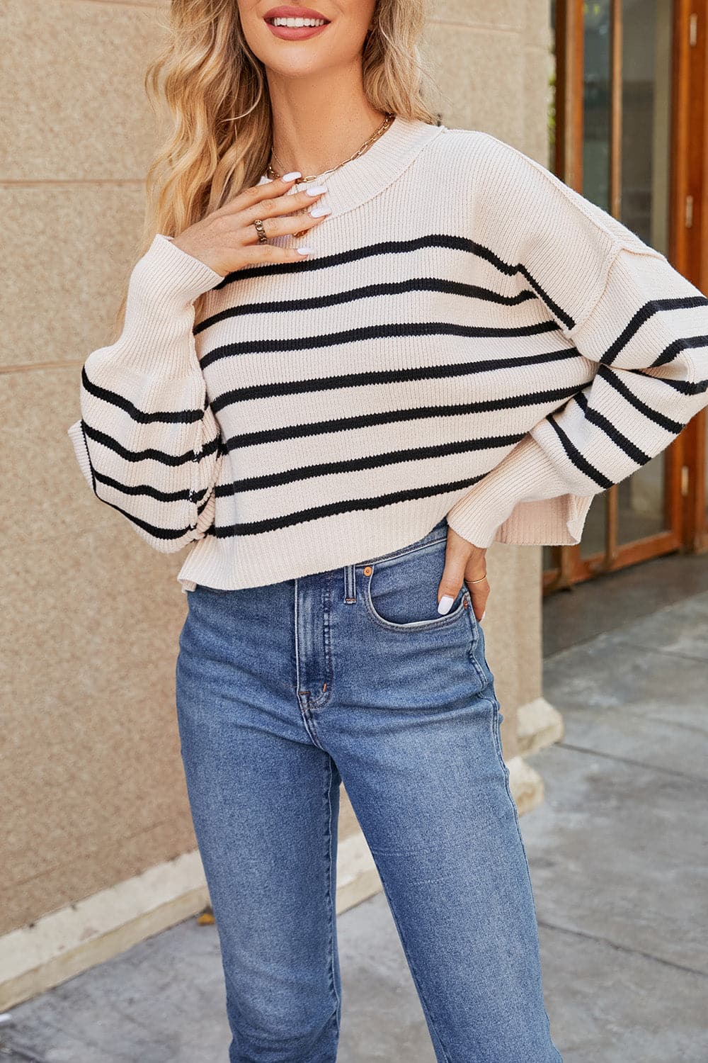 Round Neck Dropped Shoulder Sweater.