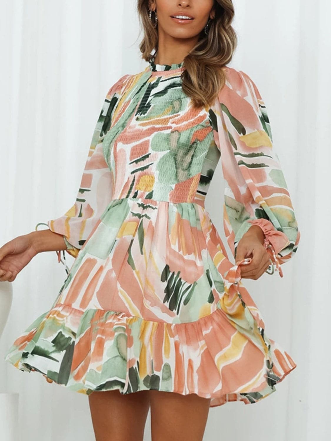 Printed Mock Neck Balloon Sleeve Mini Dress.