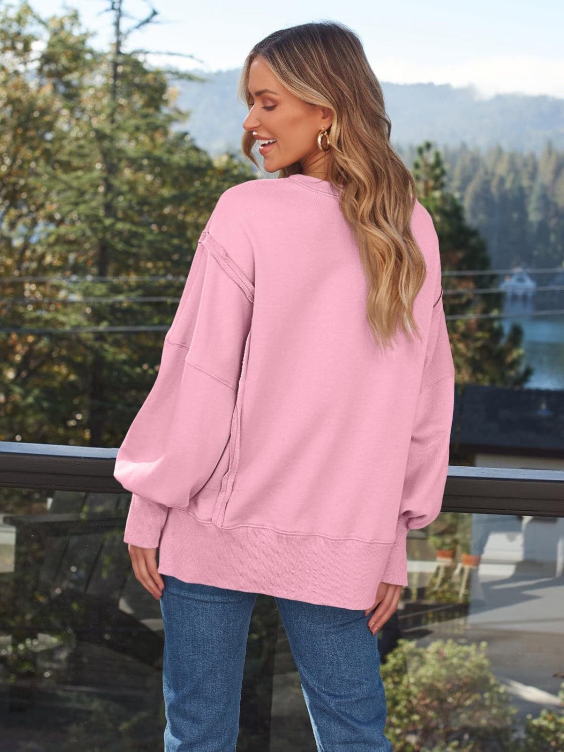 Slit Round Neck Long Sleeve Sweatshirt.