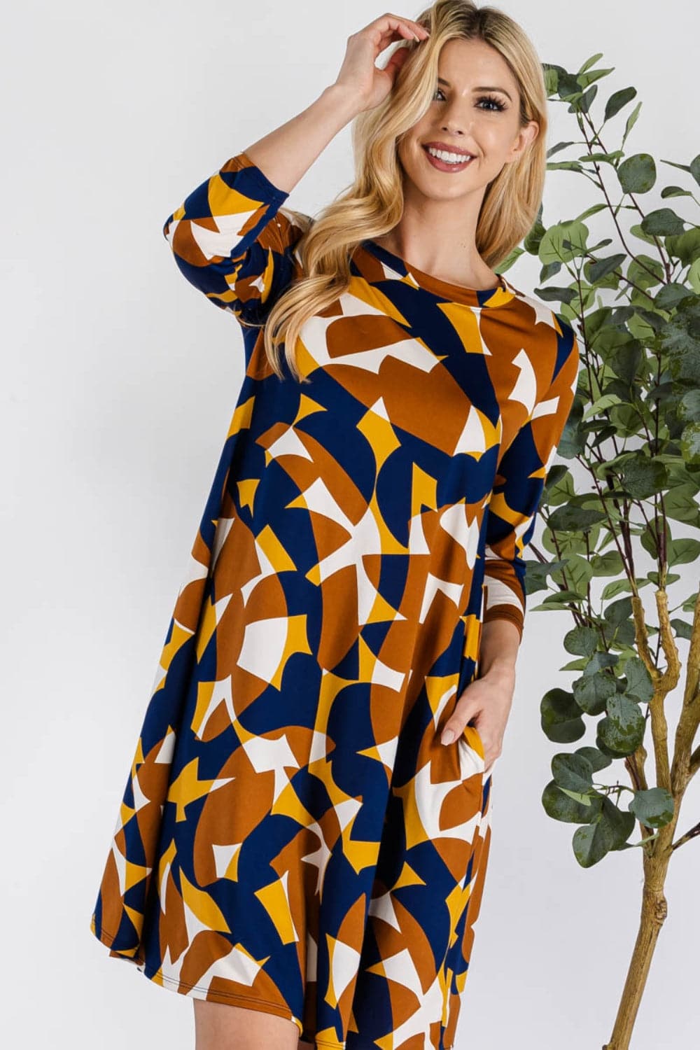 Celeste Full Size Geometric Round Neck Dress with Pockets.