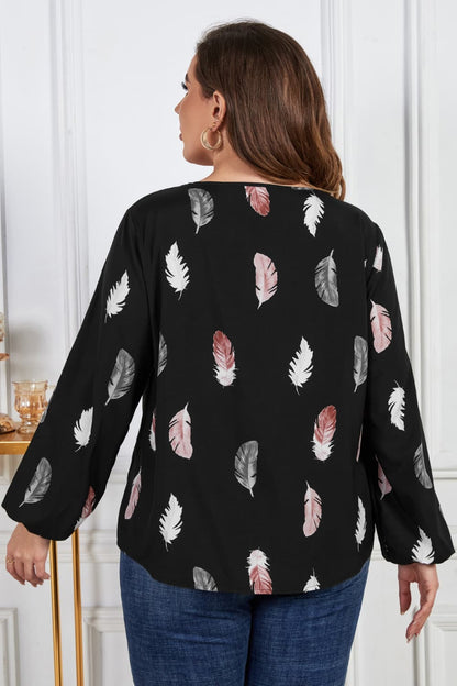 Melo Apparel Plus Size Printed Round Neck Long Sleeve Cutout Blouse.