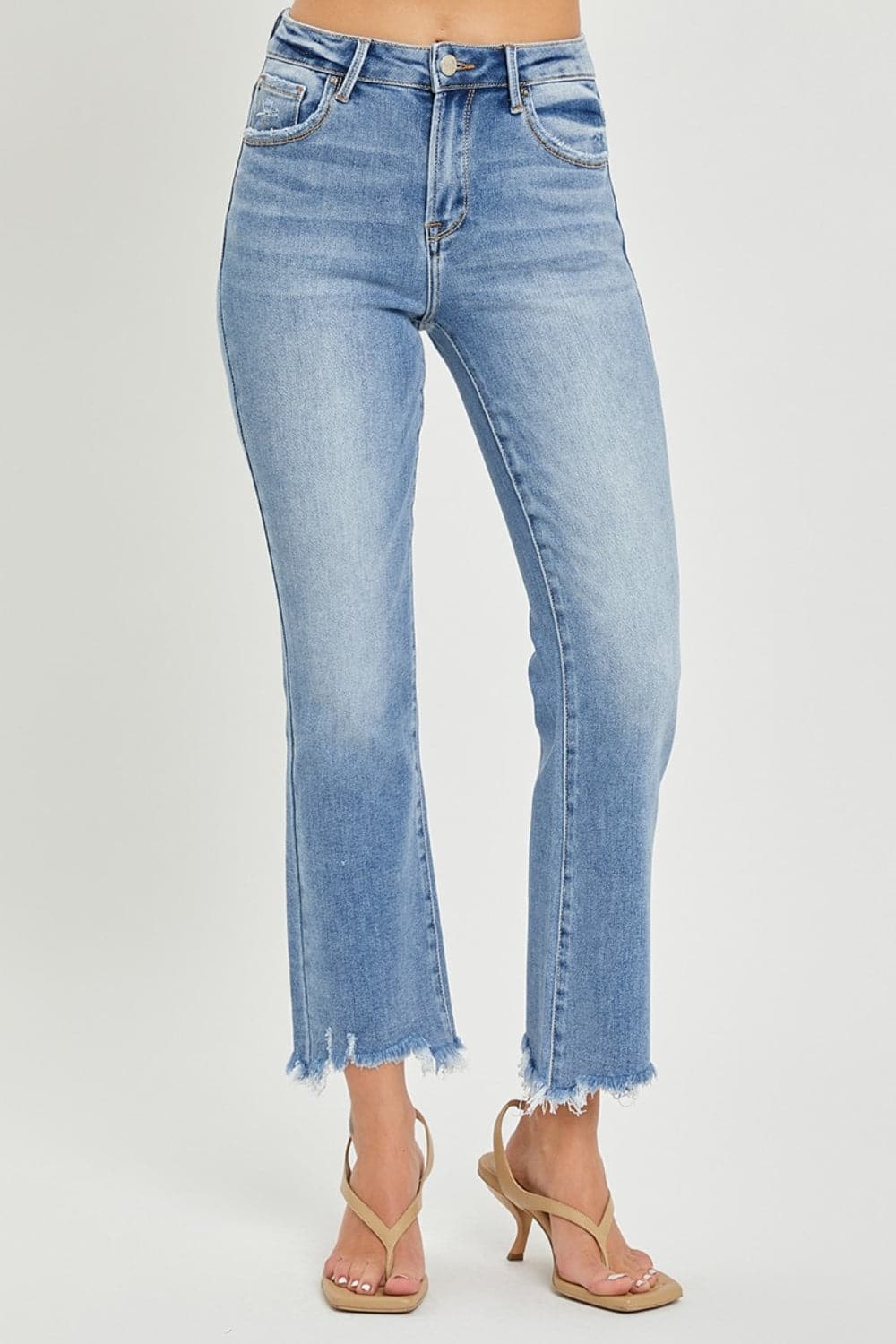 RISEN Full Size Frayed Hem Cropped Straight JeansTrendy and Stylish Design

Frayed hem cropped straight jeans are a trendy and stylish choice for a casual and chic look. The frayed hem adds a touch of edginess and Love Salve RISEN Full Size Frayed Hem Cropped Straight JeansJeans