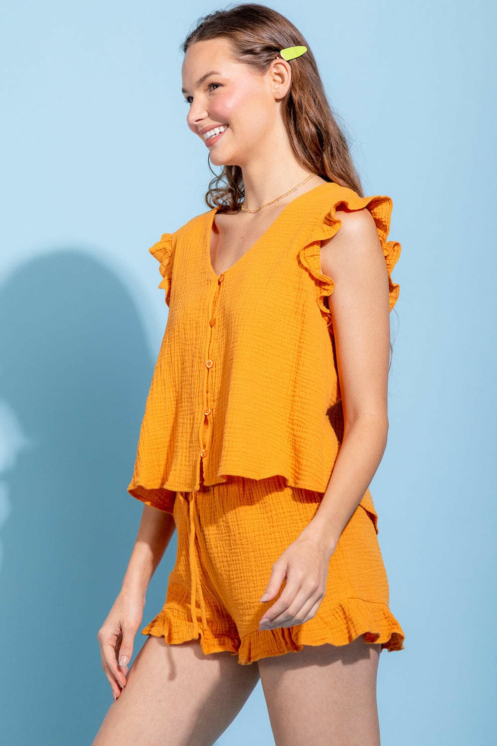 Ruffled V-Neck Cap Sleeve and Shorts SetRuffled V-Neck Cap Sleeve and Shorts Set
 Upgrade your style with our Ruffled V-Neck Cap Sleeve and Shorts Set! Step up your fashion game with this exquisite two-pieLove Salve -Neck Cap Sleevejust arrived