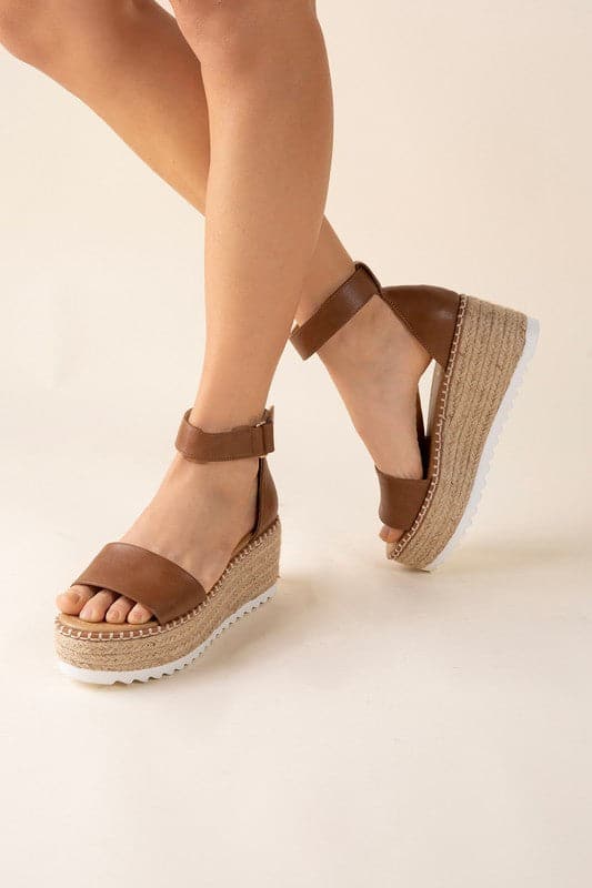 TUCKIN-S Platform Sandals.