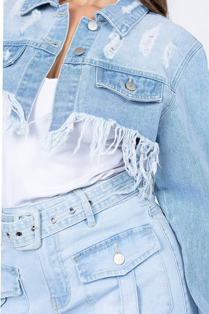 Chic cropped distressed denim jacket with stylish frayed hem