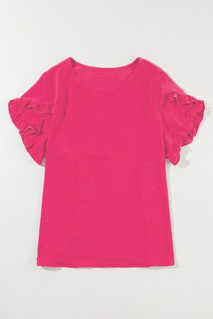 Playful pink ruffled short sleeve top for plus sizes