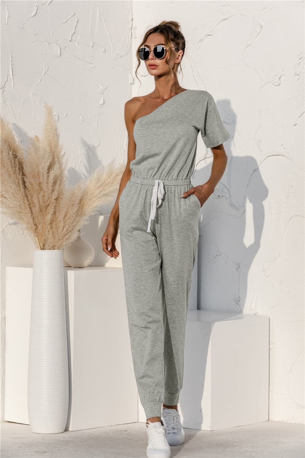 Single Shoulder Short Sleeve Jumpsuit.