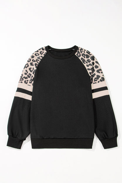 Chic colorblock sweatshirt with bold leopard print accents