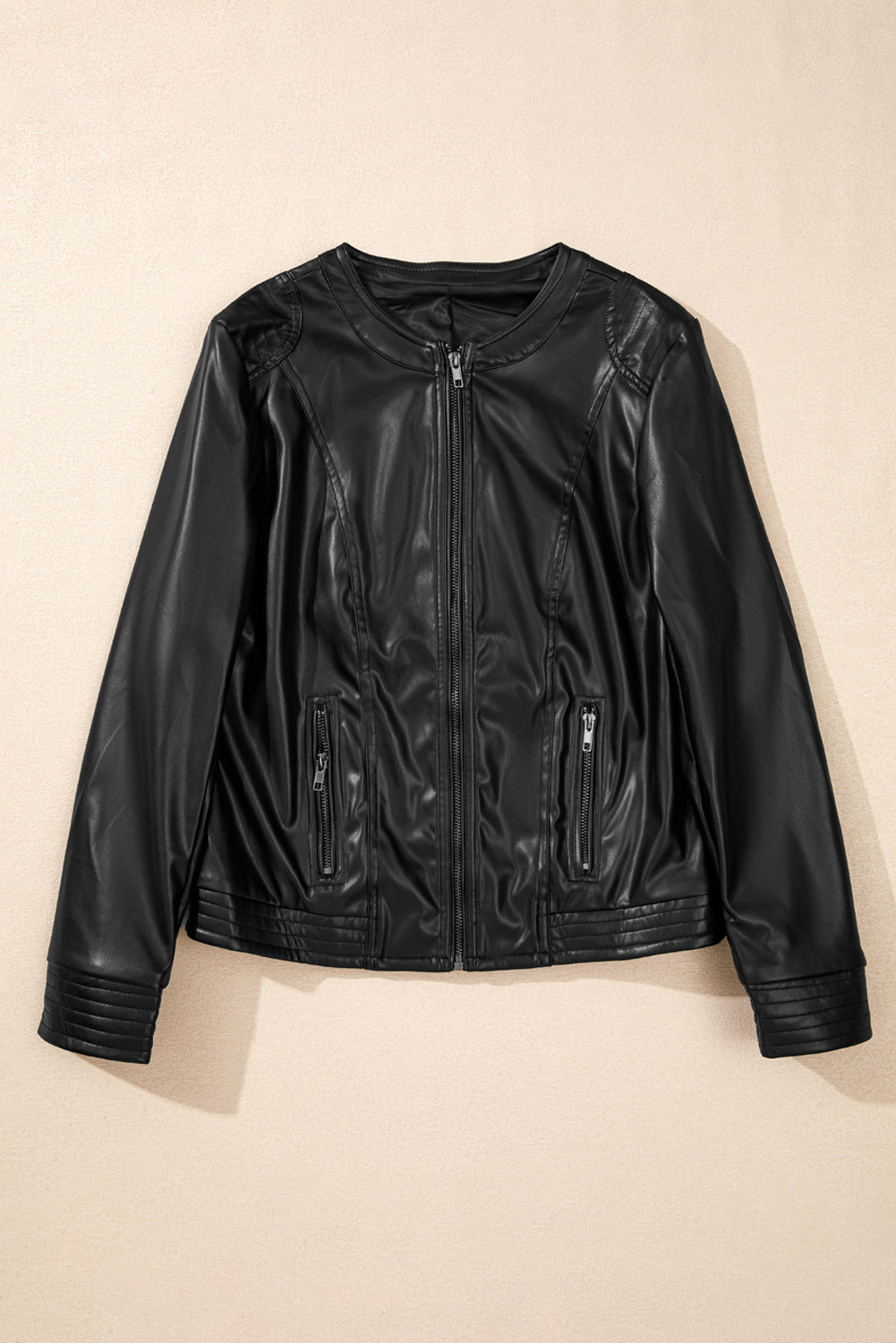 Sleek black faux leather bomber jacket with trendy zipper details