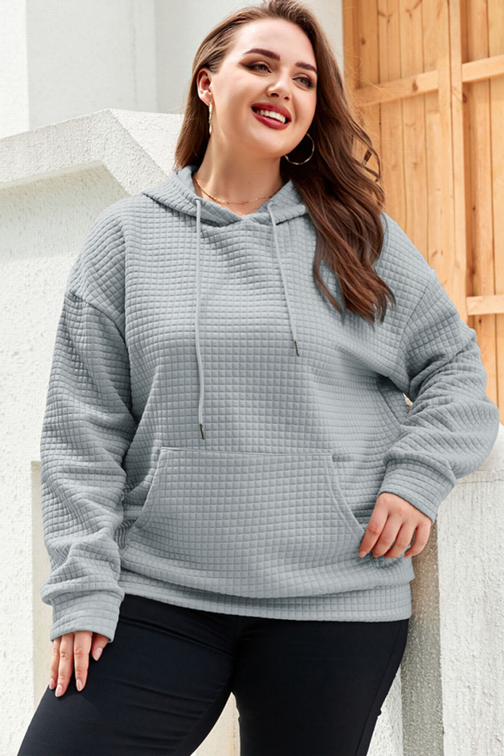 Cozy quilted gray hoodie with kangaroo pockets in plus sizes