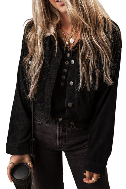 Cozy black corduroy crop jacket with fleece lining and button-up closure