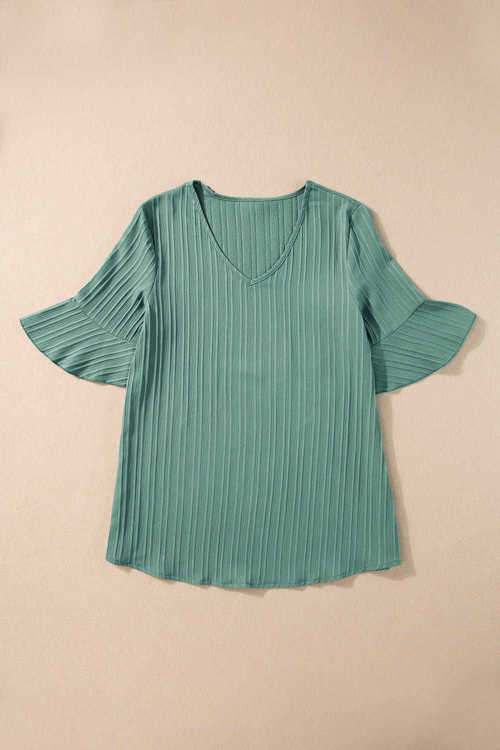 Chic grass green ruffled top with half sleeves and v-neck detail