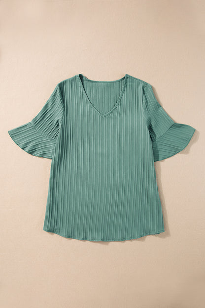 Chic grass green ruffled top with half sleeves and v-neck detail