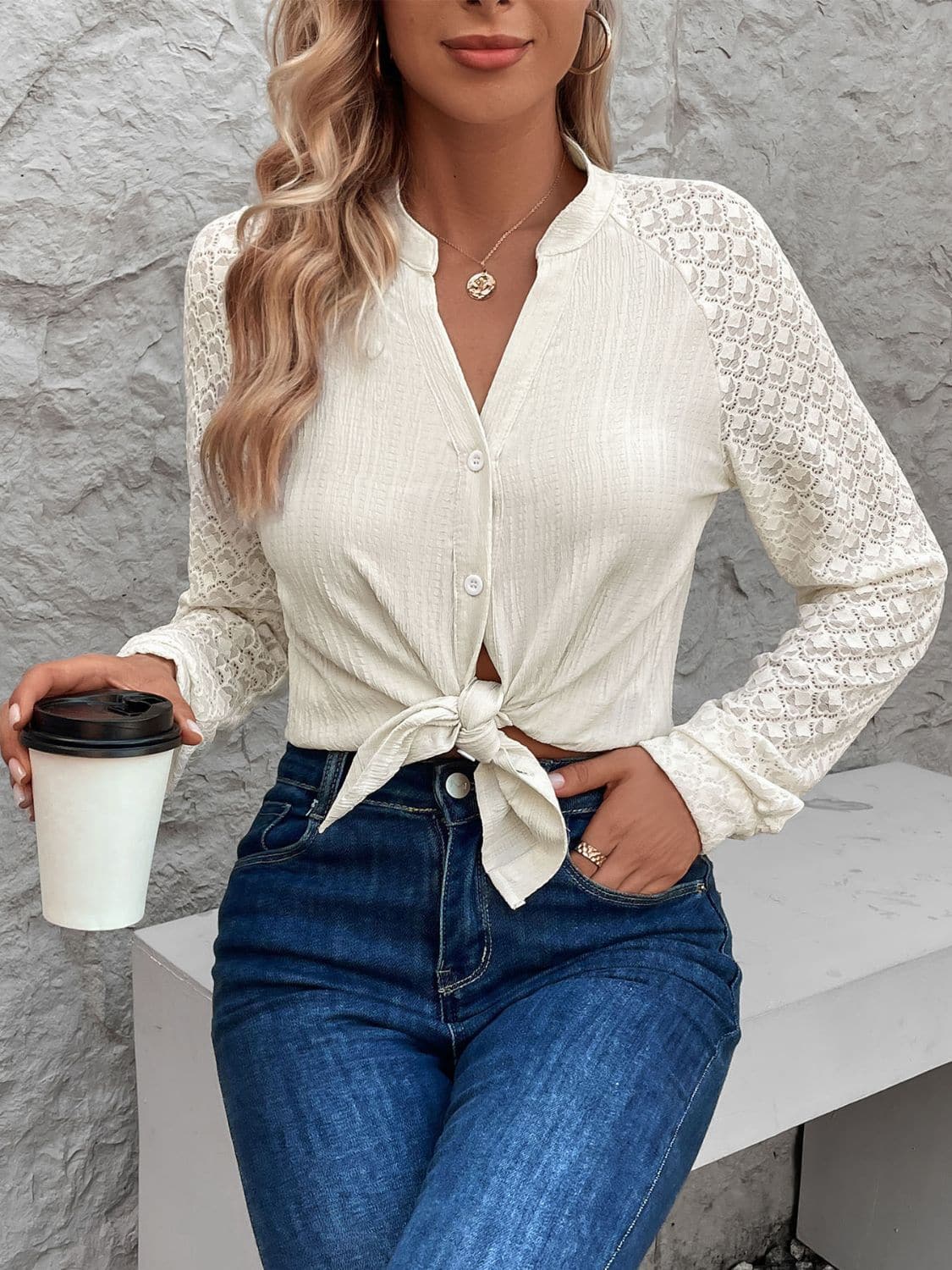 Textured Notched Long Sleeve Shirt.