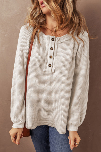 Cozy oatmeal waffle knit blouse with buttoned front and raglan sleeves