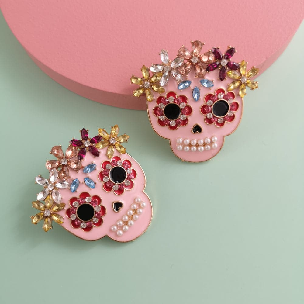 Rhinestone skull earrings in alloy