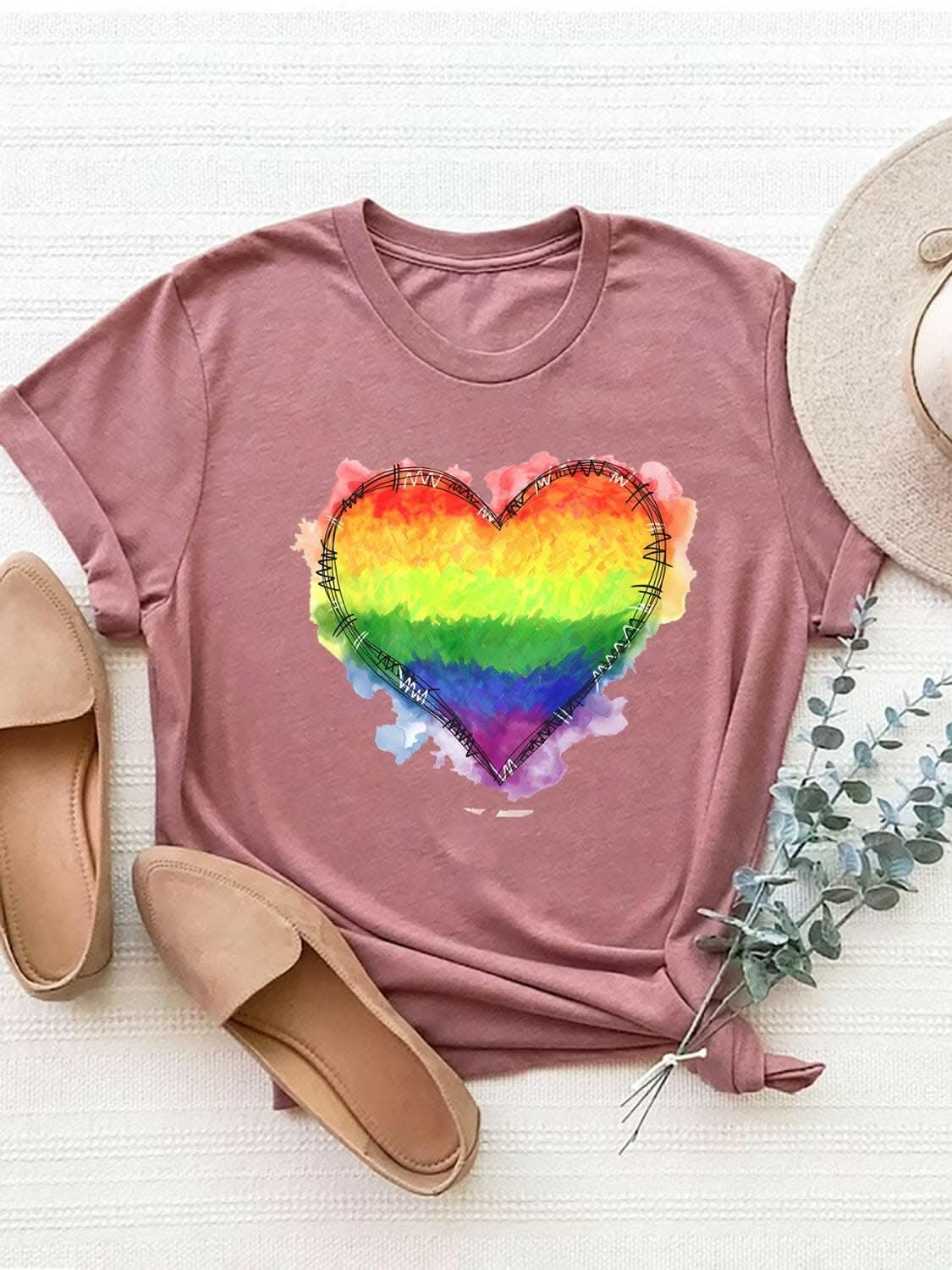 Heart graphic round neck short sleeve tee with rainbow design.