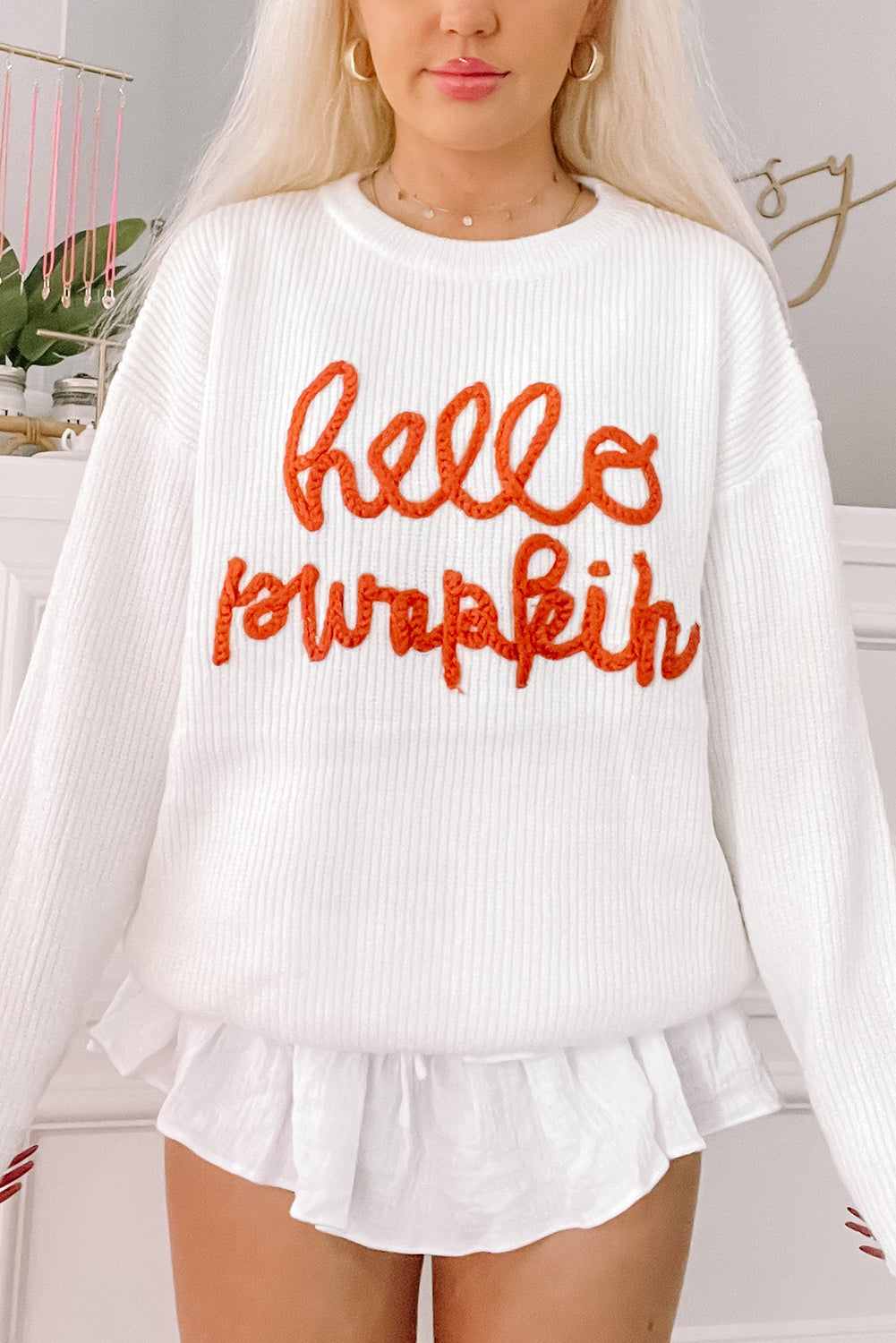 Cozy white pumpkin graphic sweater for autumn days