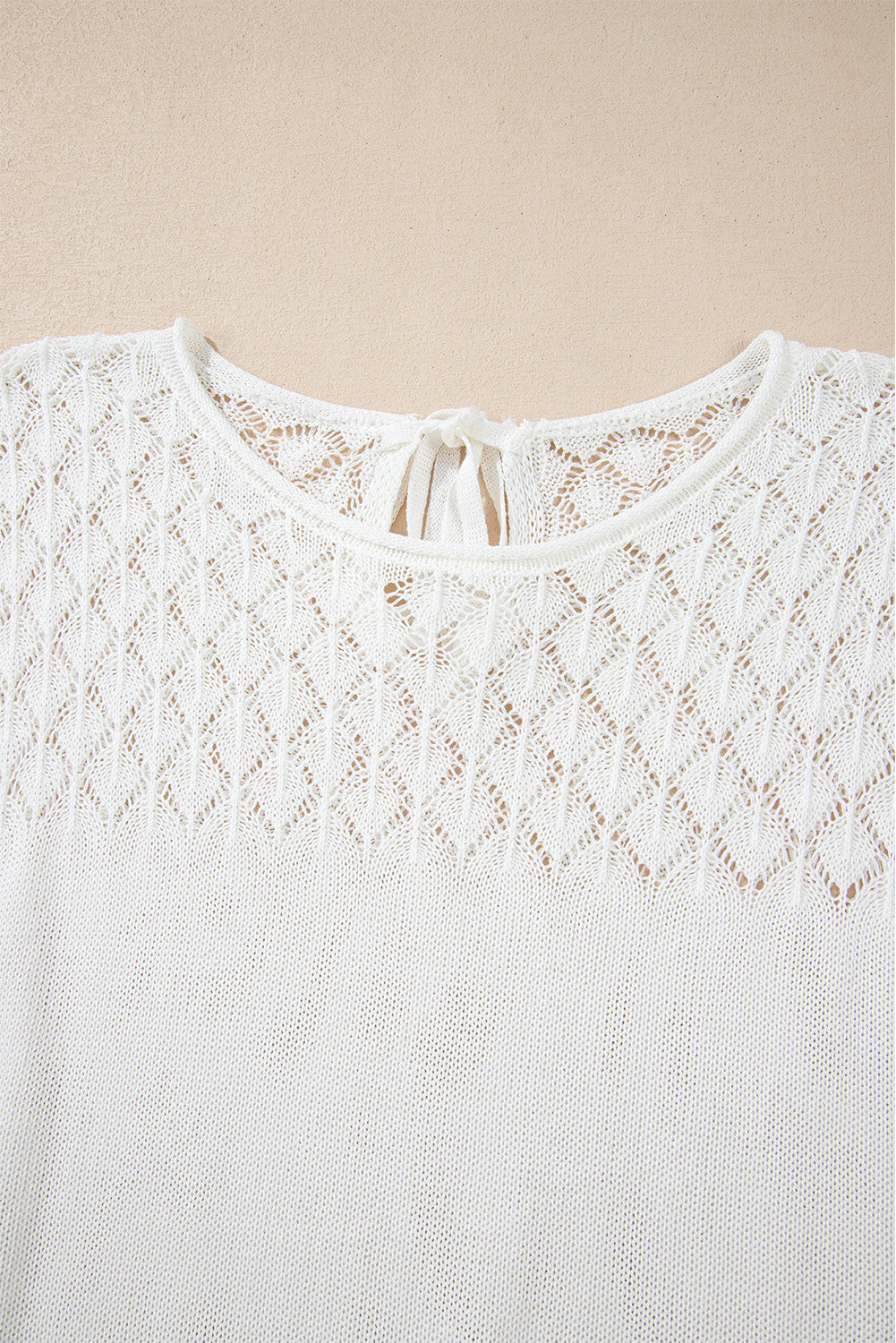 Elegant White Eyelet Knit Short Sleeve Sweater with Tied Back Detail