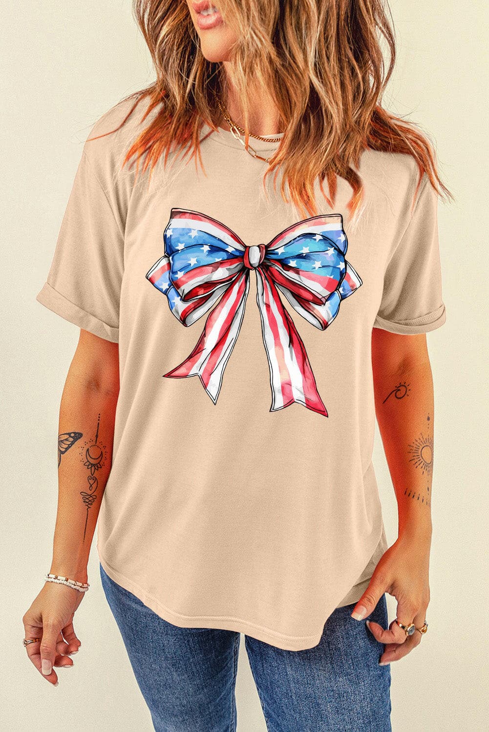 Bow graphic tee with round neck, soft fabric, featuring chic bow design.