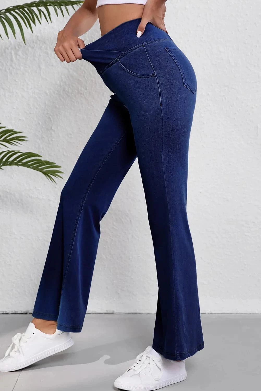 Asymmetric waist flare jeans