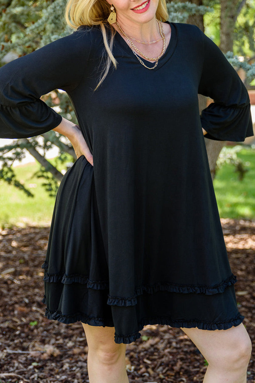 Chic black plus size ruffled sleeve dress for effortless elegance