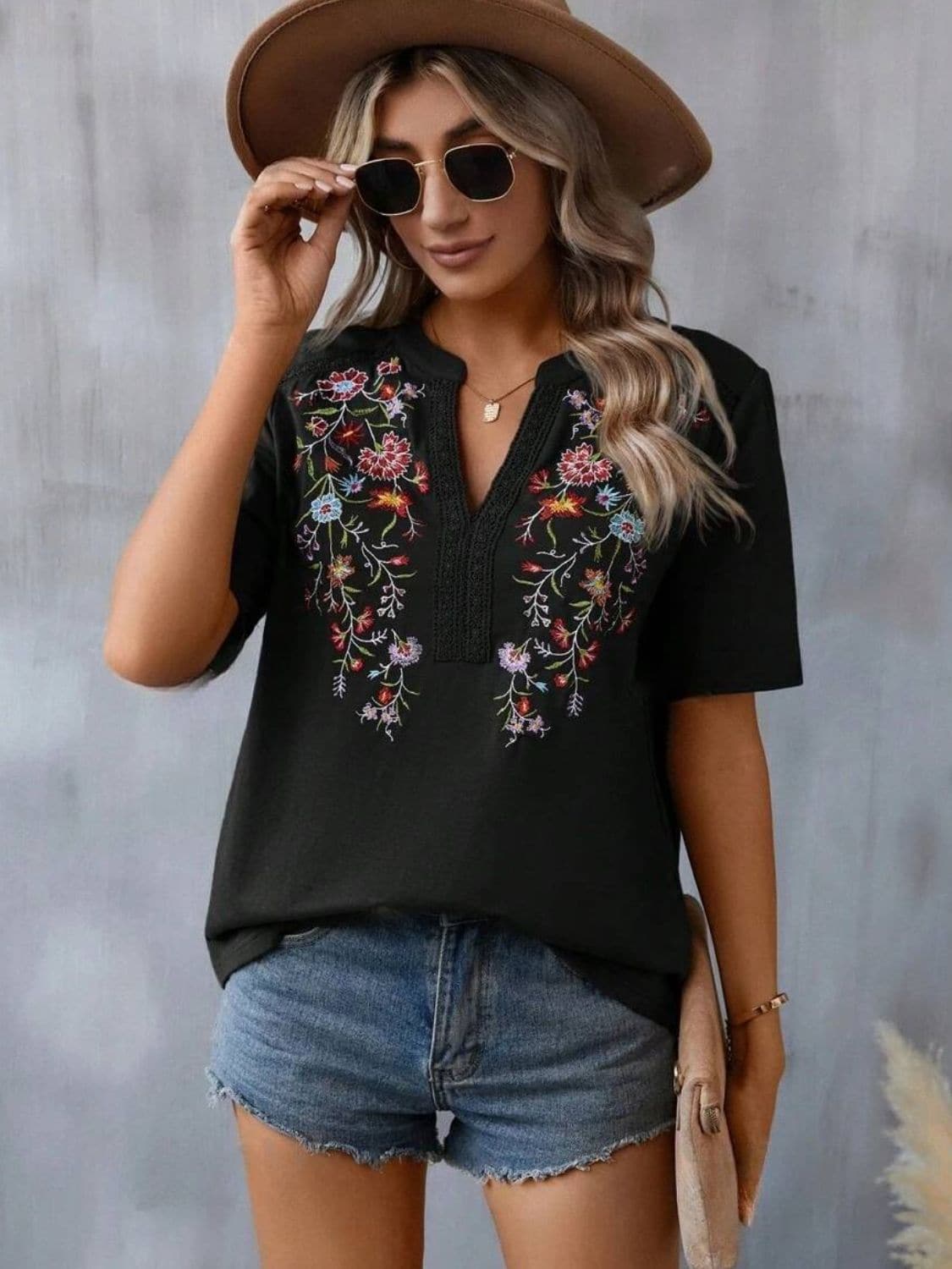 Embroidered Notched Short Sleeve T-Shirt.