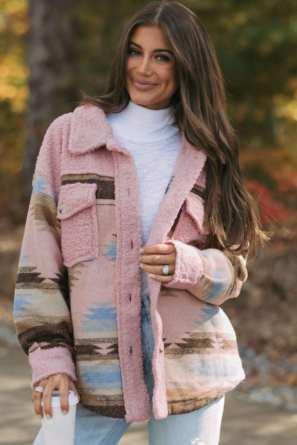 Cozy pink Aztec print sherpa coat with flap pockets